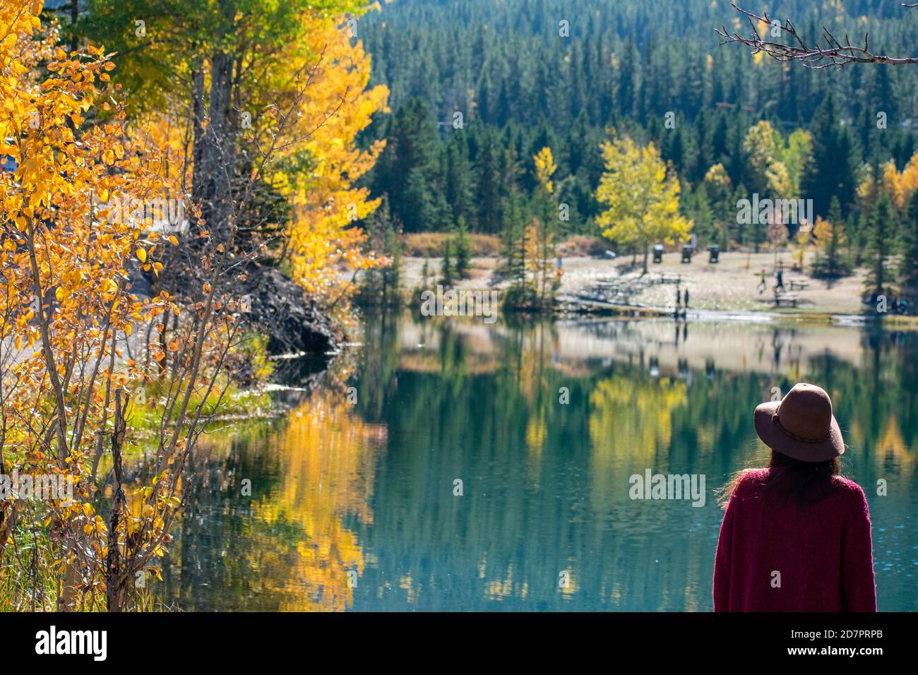 Woman watching autumn landscape Stock Photo