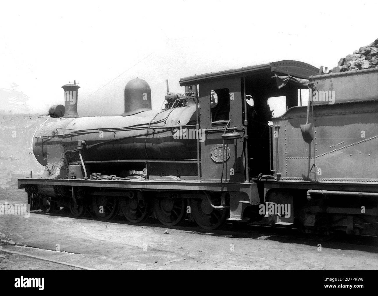 Historical Railroad Photo / Historical Locomotive:  Class 7 984 (4-8-0) Location: Walvisbaai; South West Africa. The Class 7 was about to pull their train from Walvis Bay to Usakos. ca.   1955 Stock Photo