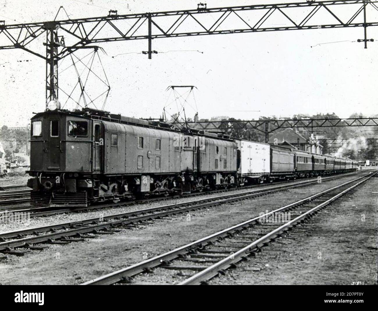 South Africa History:  SAR Class 1E locomotives on a passenger train; Durban ca. 1930 Stock Photo