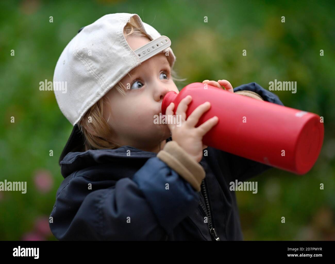 Toddler, boy, 2 years, drinks from water bottle, Stuttgart, Baden-Wuerttemberg, Germany Stock Photo