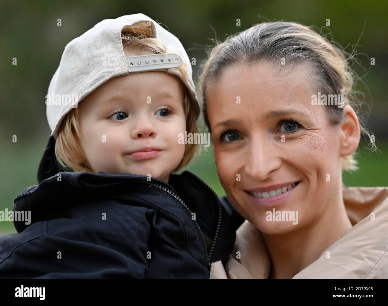 Mother holds son, 2 years old, in her arms, Stuttgart Baden-Wuerttemberg, Germany Stock Photo