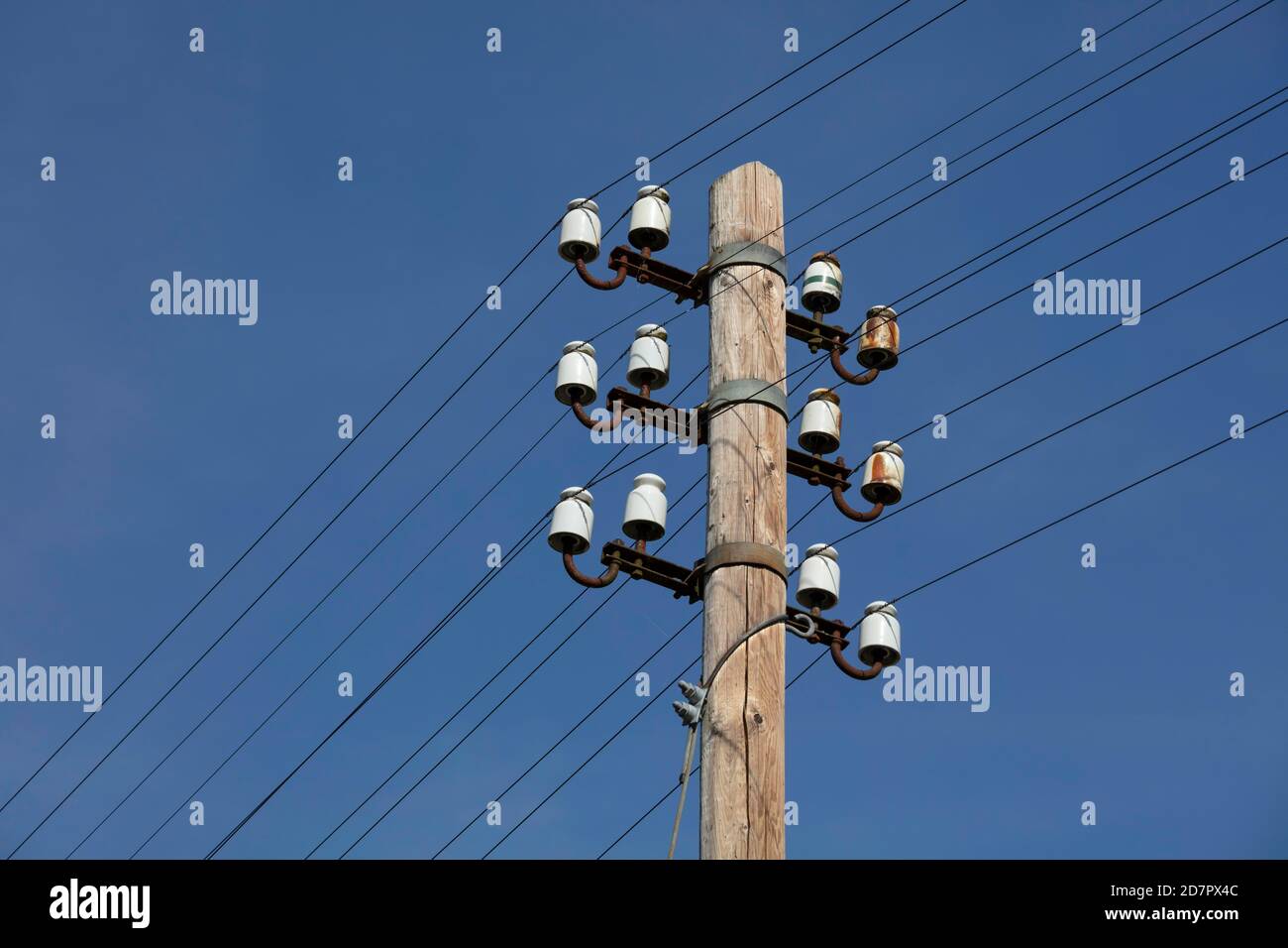 Old power pole with ceramic insulators, Schliersee, Upper Bavaria, Bavaria, Germany Stock Photo