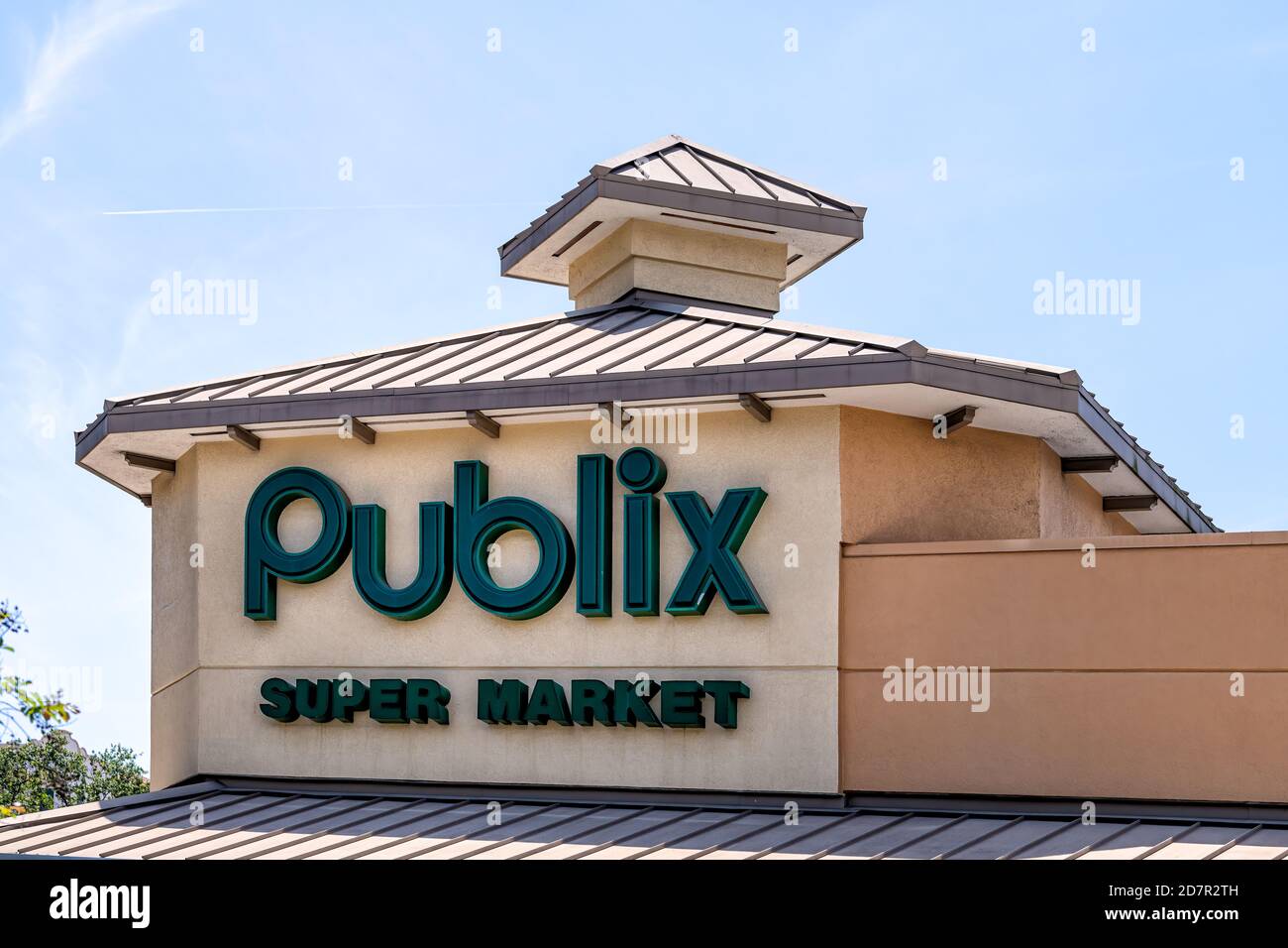 Tampa, USA - April 27, 2018: Downtown city in Florida and closeup of sign for Publix grocery store super market on building exterior Stock Photo