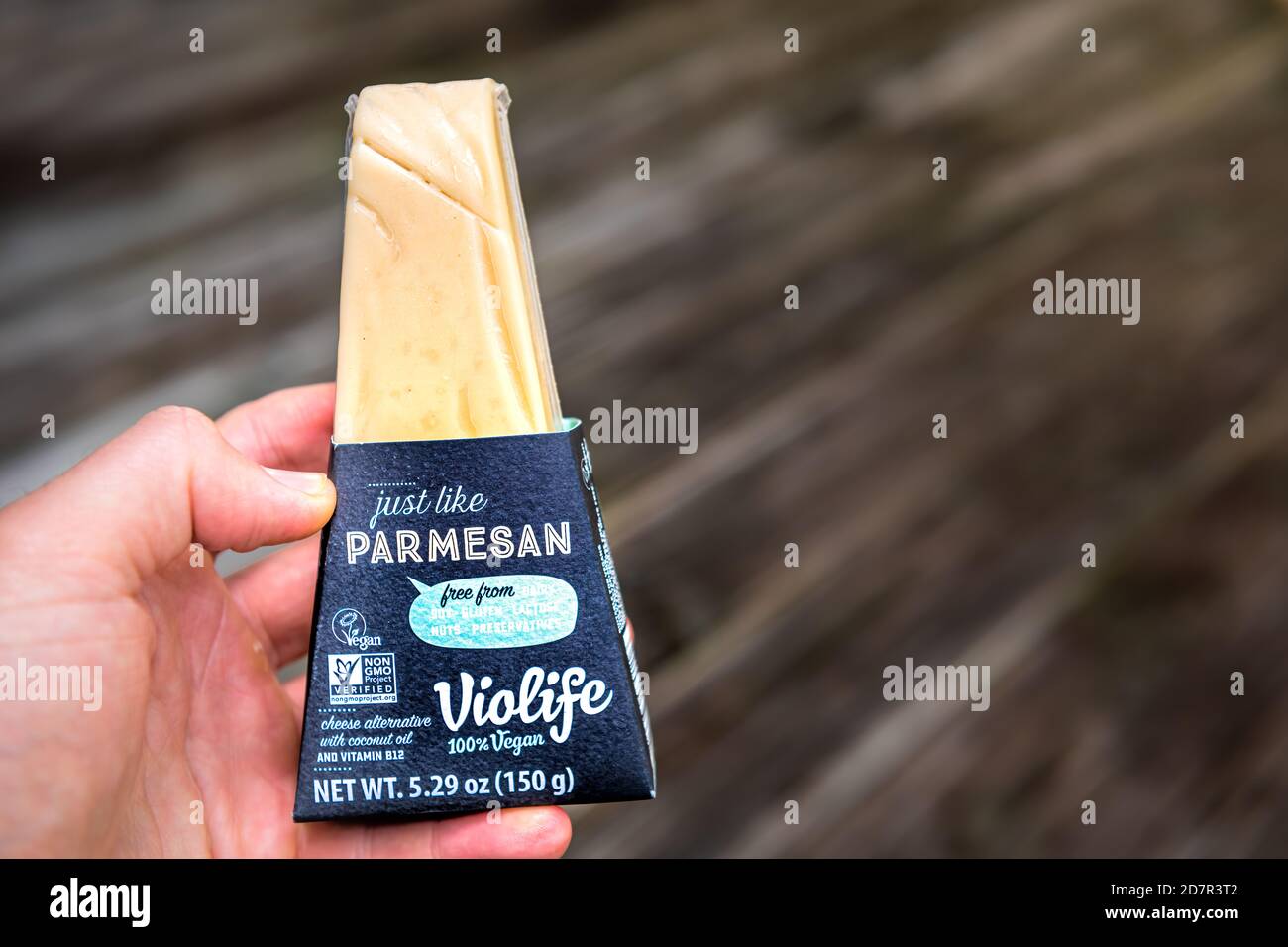 Herndon, USA September 4, 2020 Closeup of hand holding vegan food