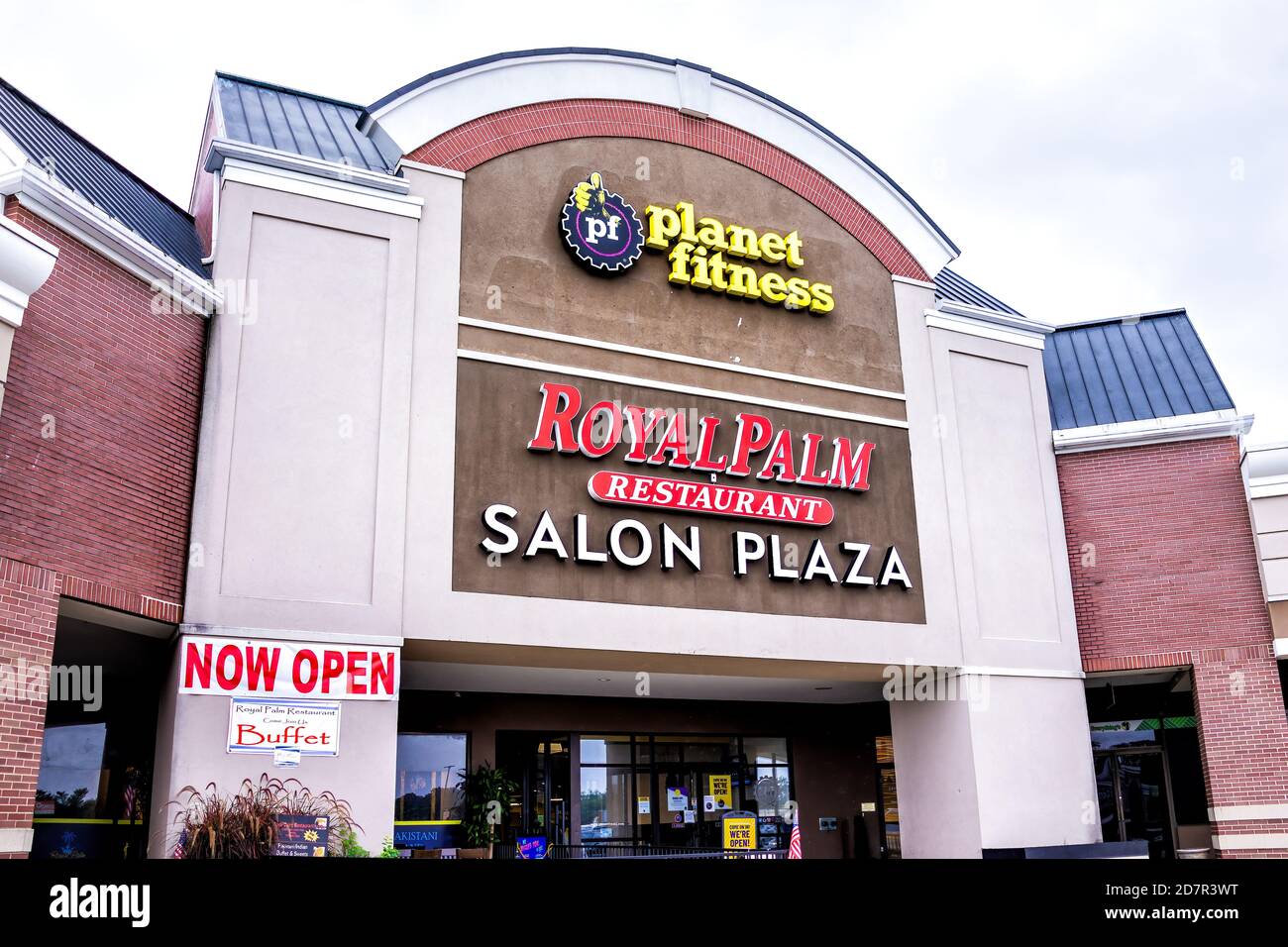 Sterling, USA - September 9, 2020: Stores at strip mall plaza with planet fitness sign and now open during coronavirus in Virginia Stock Photo