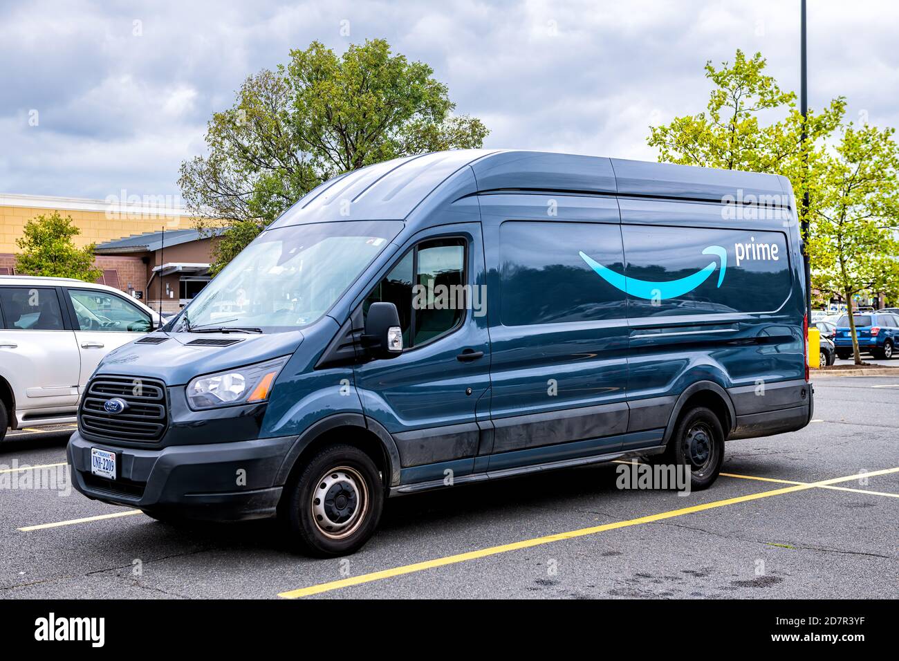 Sterling, USA - September 12, 2020: Amazon delivery van vehicle parked on  parking lot of Walmart retail store with Prime logo on car Stock Photo -  Alamy