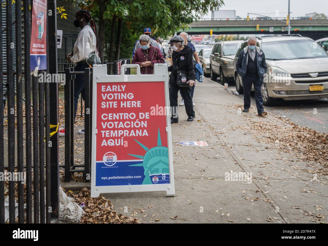 Bronx, United States. 24th Oct, 2020. Voters wait for hours on long