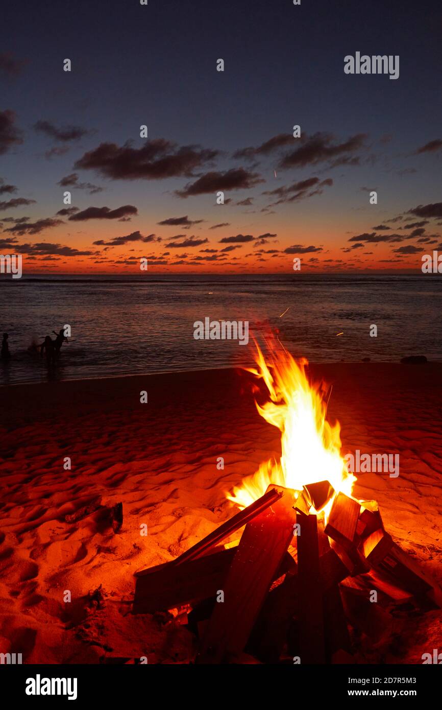 Fire on beach by Wilsons Bar, Castaway Resort, Rarotonga, Cook Islands, South Pacific Stock Photo