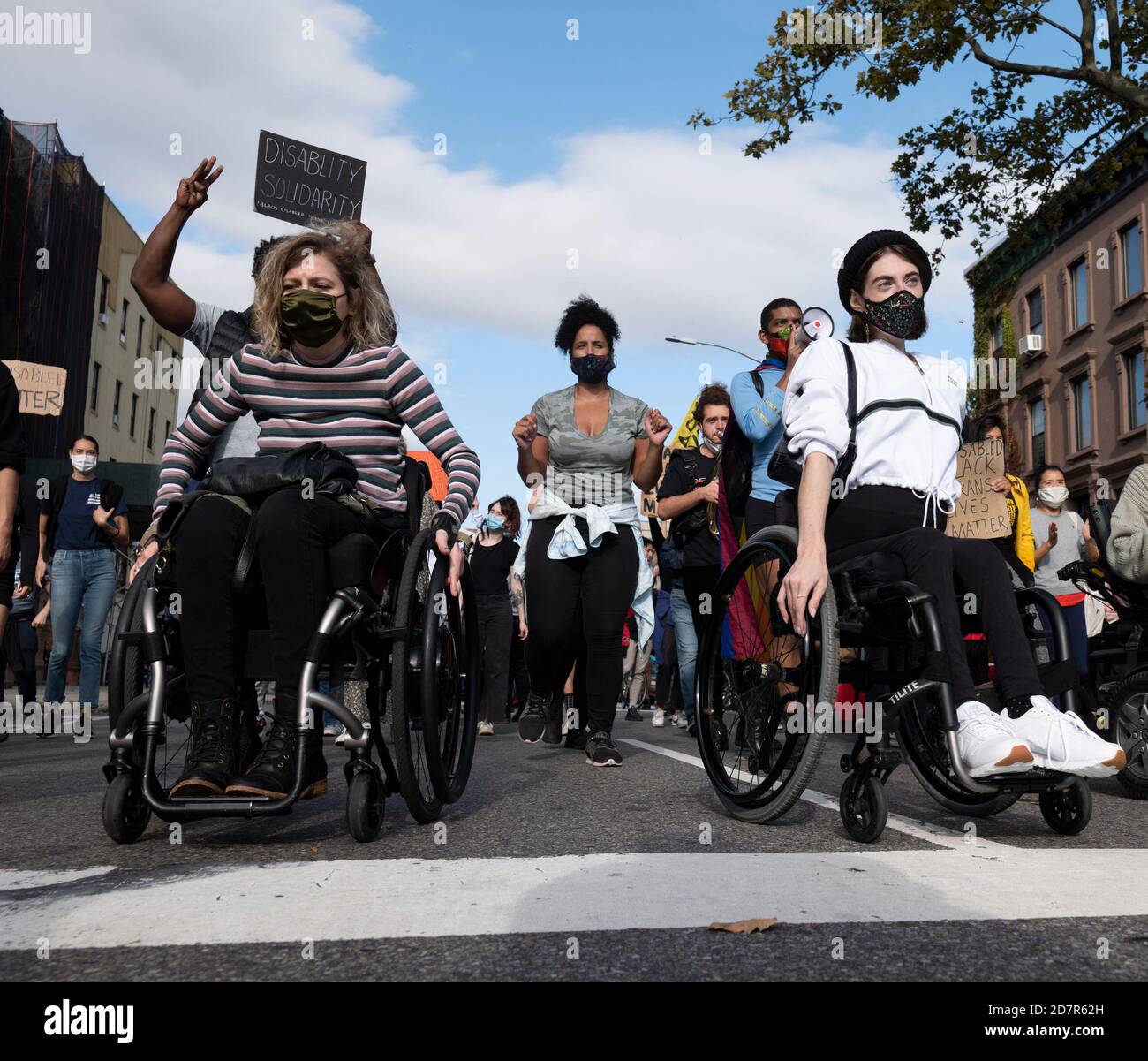 New York, New York, USA. 24th Oct, 2020. GG DEFIERBRA, LEFT AND BRI SCALESSE participate in the Black Disabled Lives Matter protest in New York, New York The demonstrators Marched down Harlem streets to Marcus Garvey park and gave speeches on the life of disabled persons. Credit: Brian Branch Price/ZUMA Wire/Alamy Live News Stock Photo