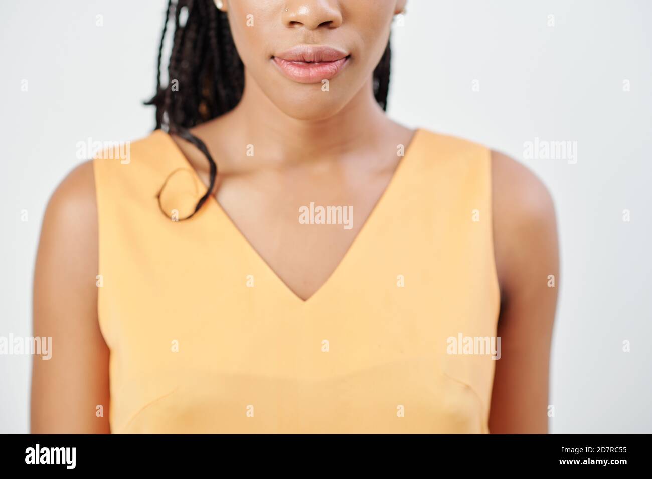 Serious woman with full lips Stock Photo
