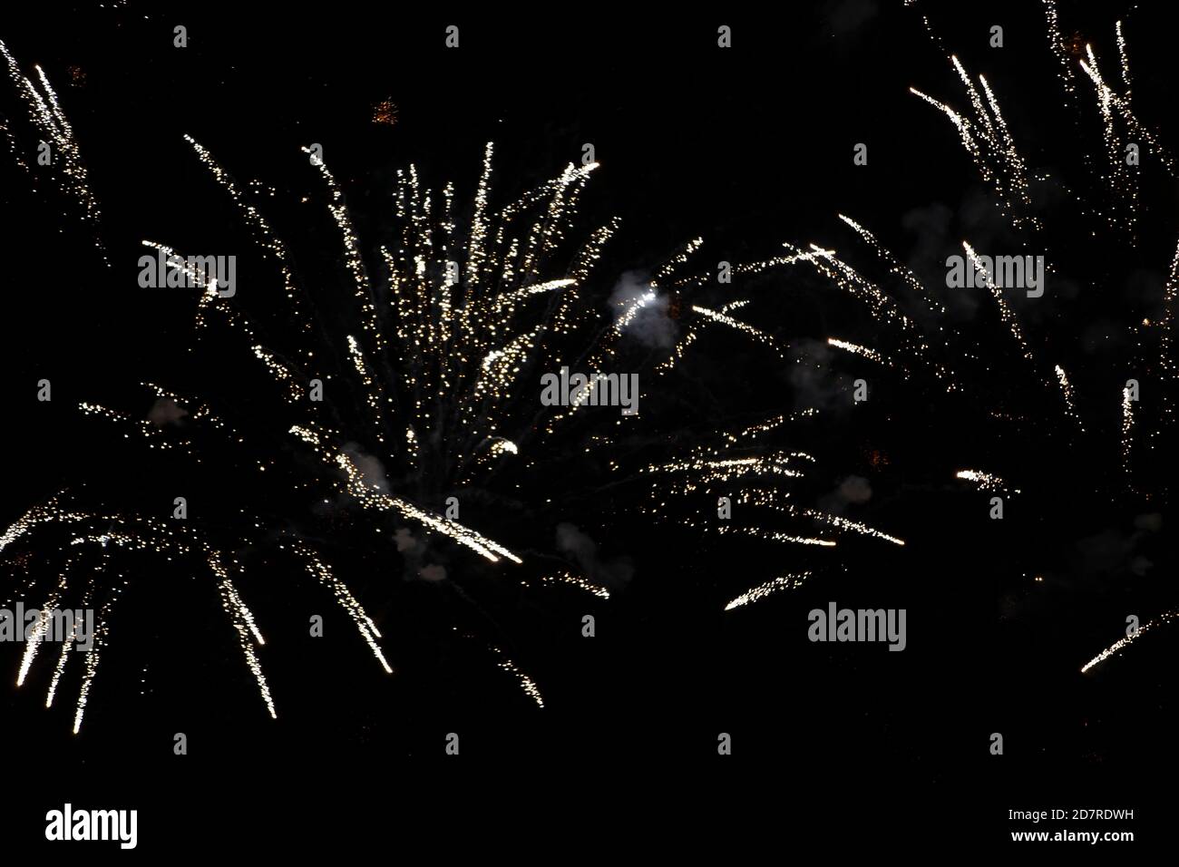 On a black background, rays and sparks of scattering fireworks Stock ...