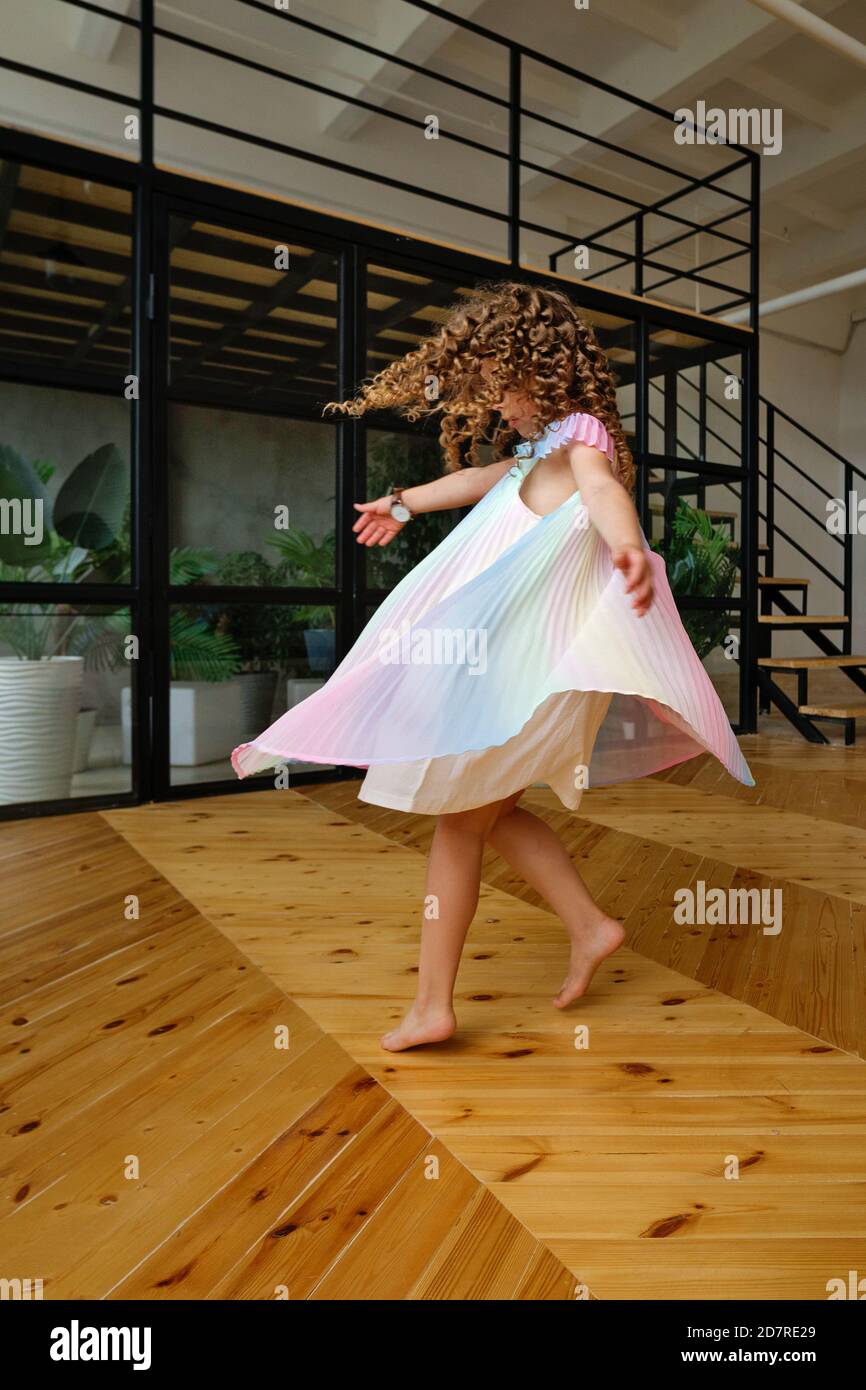Full Length View of Joyful Girl Dance. Studio Shot of Wonderful Curly