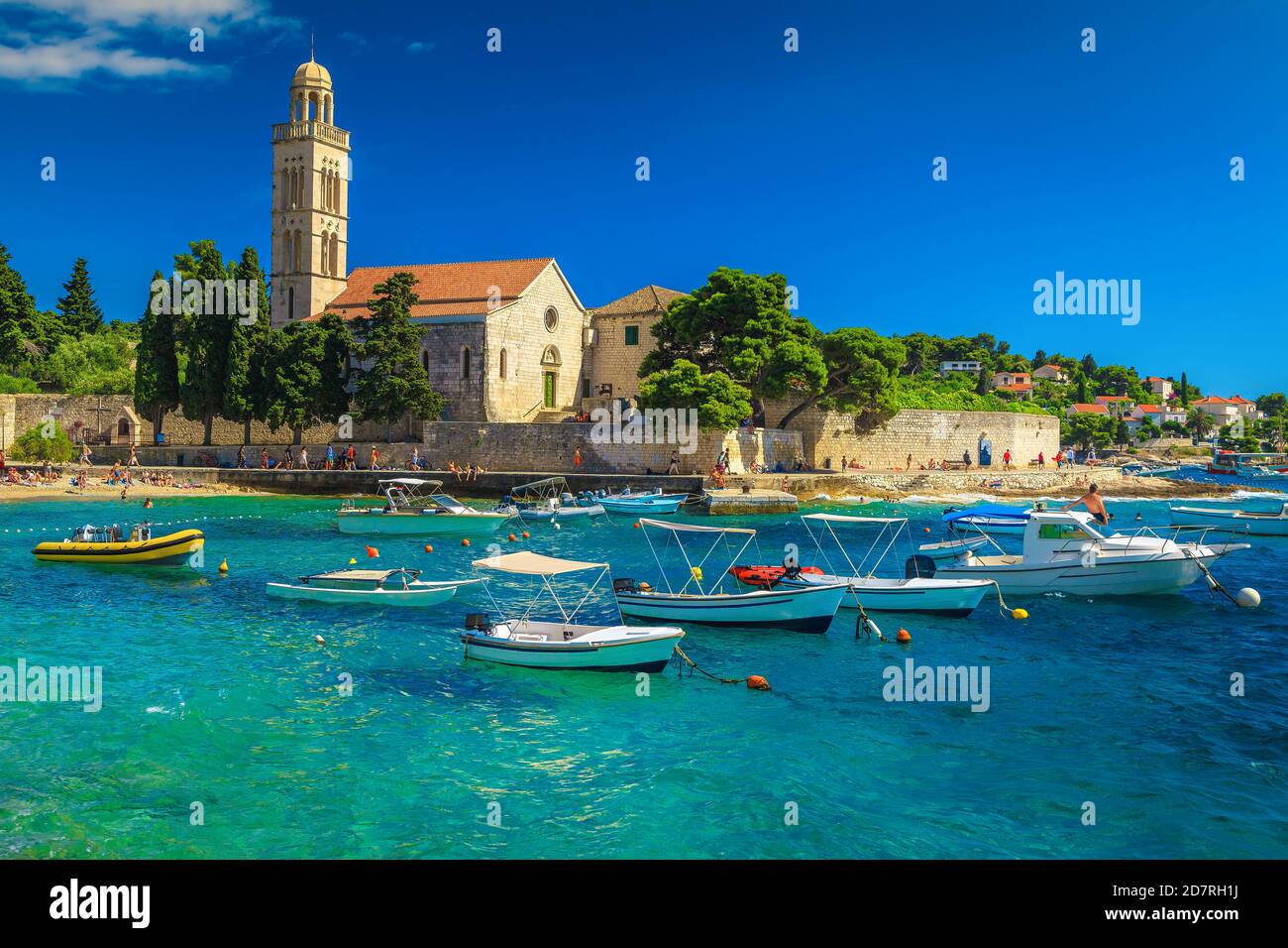 Wonderful bay with and boats. Spectacular walkway and stone church with tower on the waterfront, Hvar, Hvar island, Dalmatia, Europe Stock Photo - Alamy