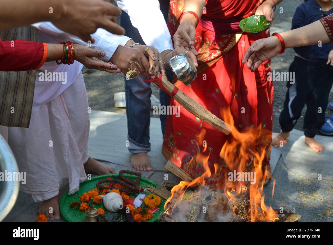 Hindu ritual called 'Yagya or Yajna'. performed with traditional mantra chanting. Pictured in Kathmandu, Nepal. Stock Photo