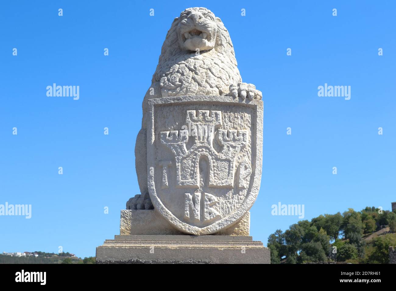 Lion at the entrance of the Medieval fortress Tsarevets Stock Photo