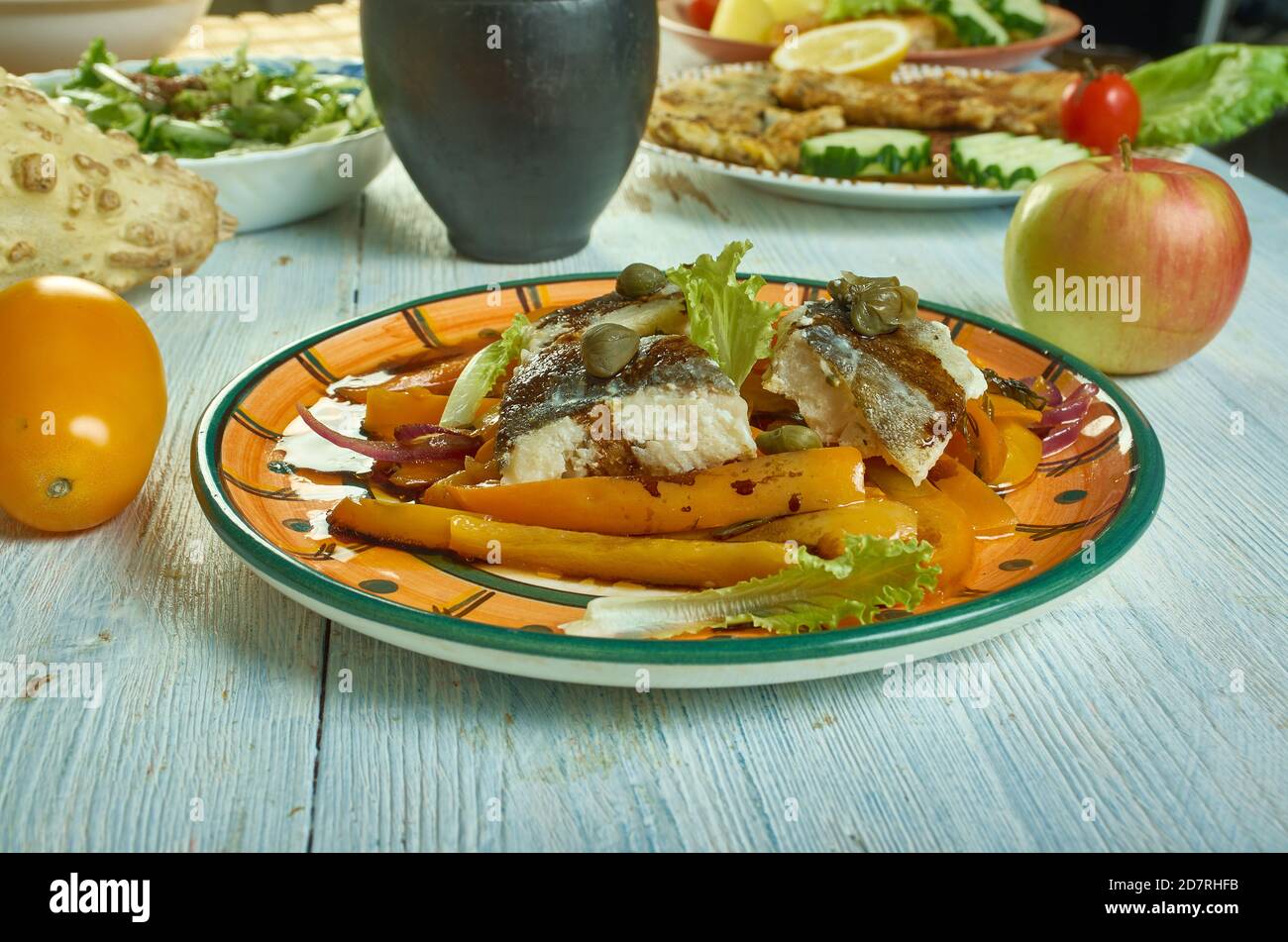 Italian Baccala mediterraneo Dried and salted cod with paprkia close