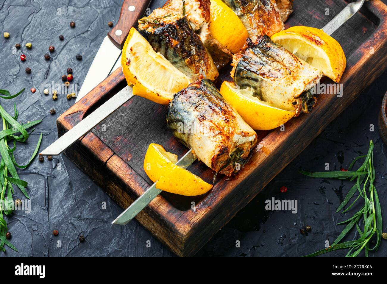 Grilled skewers of mackerel with lemon.Grilled fish kebab Stock Photo