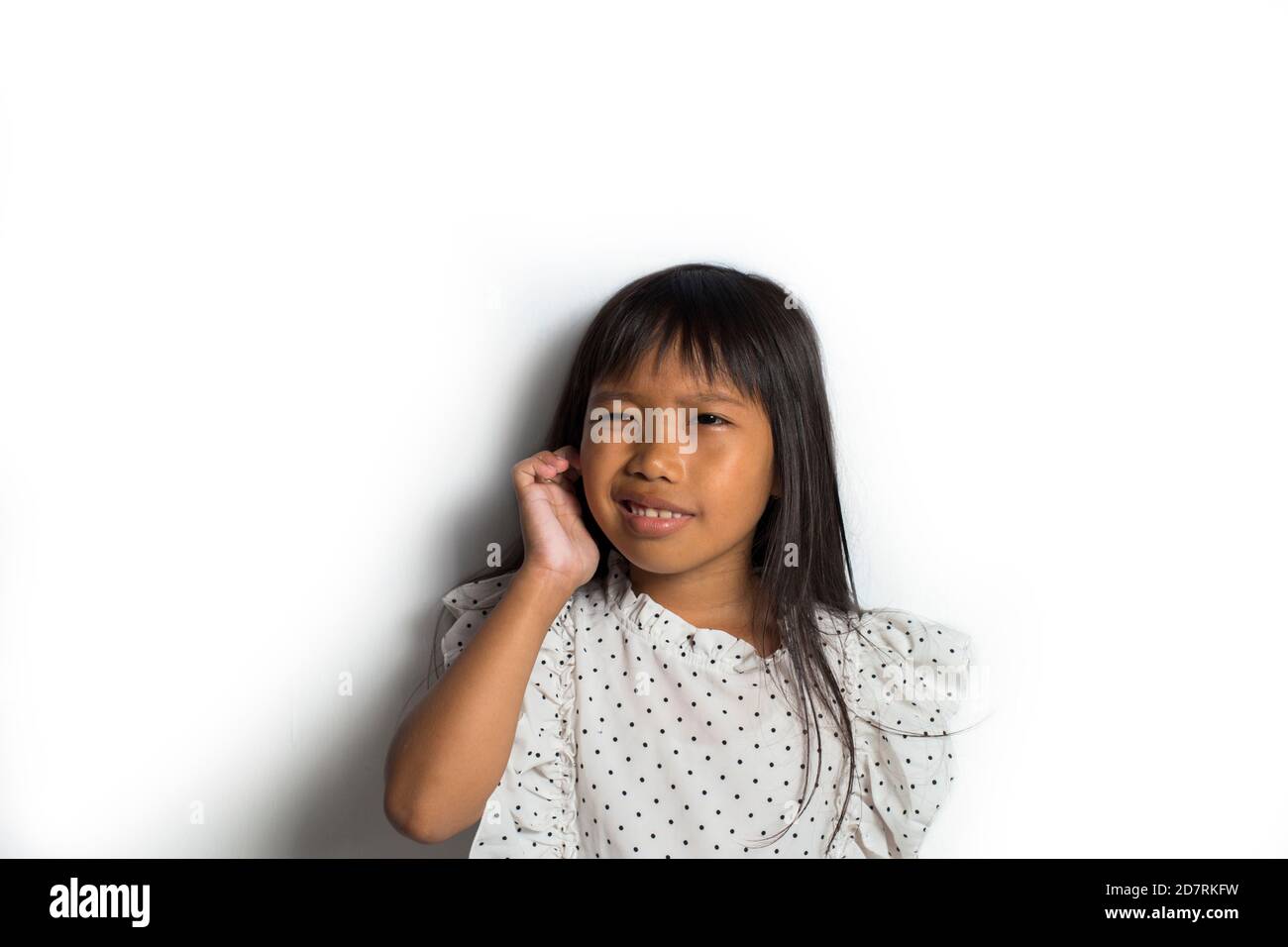 Asian little girl itching scratching her head Stock Photo Alamy