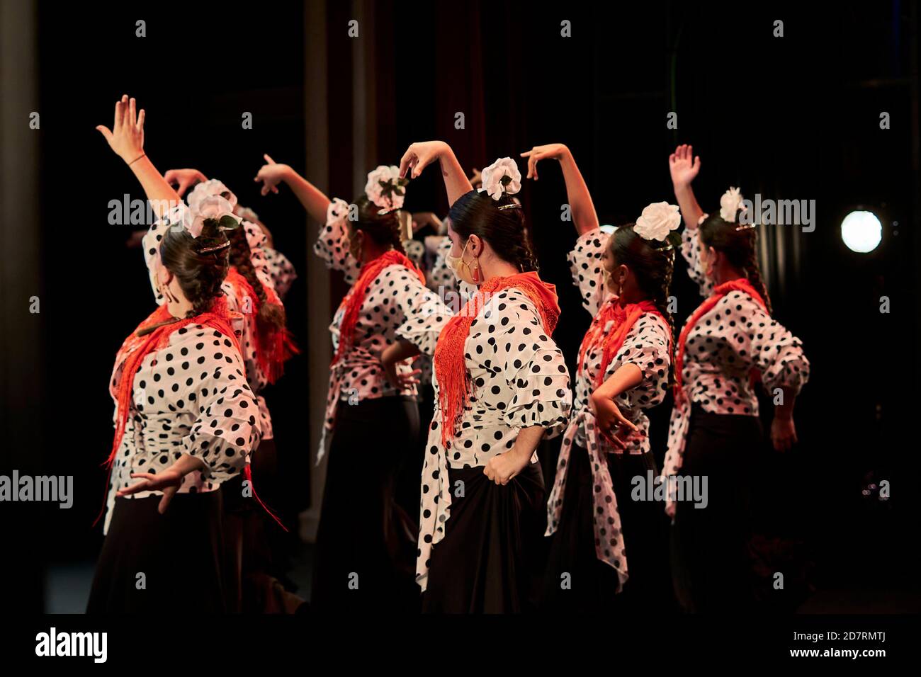 Alcala de Henares, Spain. 24 October, 2020. Dancers with face masks during the 'Volver' flamenco dance festival at Cervantes theater in Alcala de Henares, Spain. In Madrid, the capacity limitation in theaters is between 50% and 75% as a preventive measure against Covid-19. Credit: May Robledo/Alfa Images/Alamy Live News Stock Photo