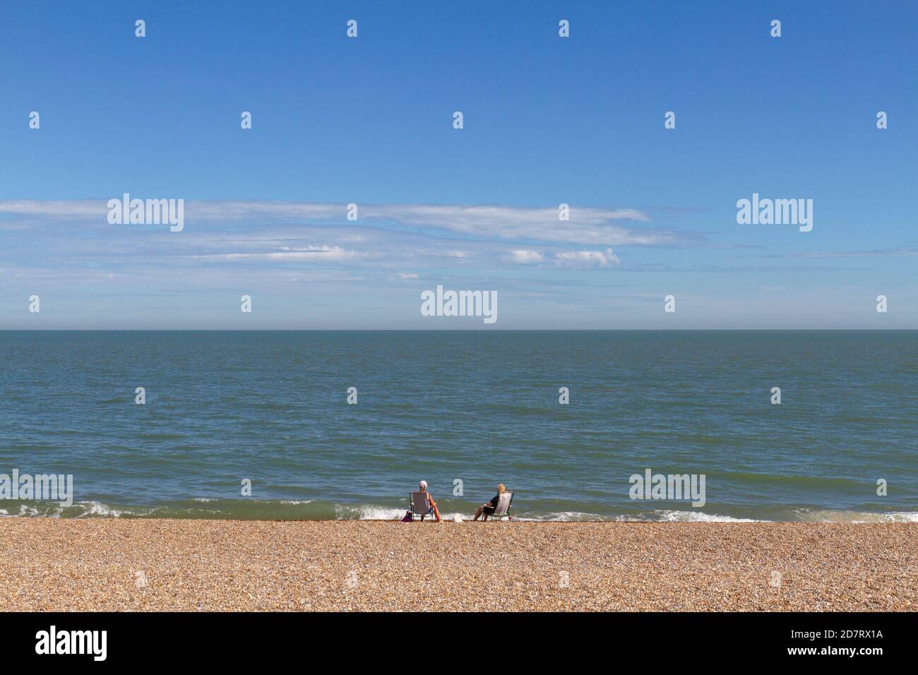 Two women on beach hi-res stock photography and images - Alamy