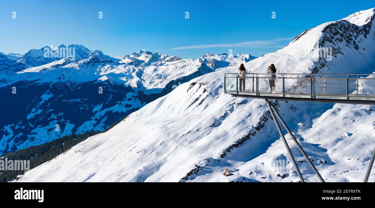 Wide panoramic view of winter landscape with snow covered peaks in ...