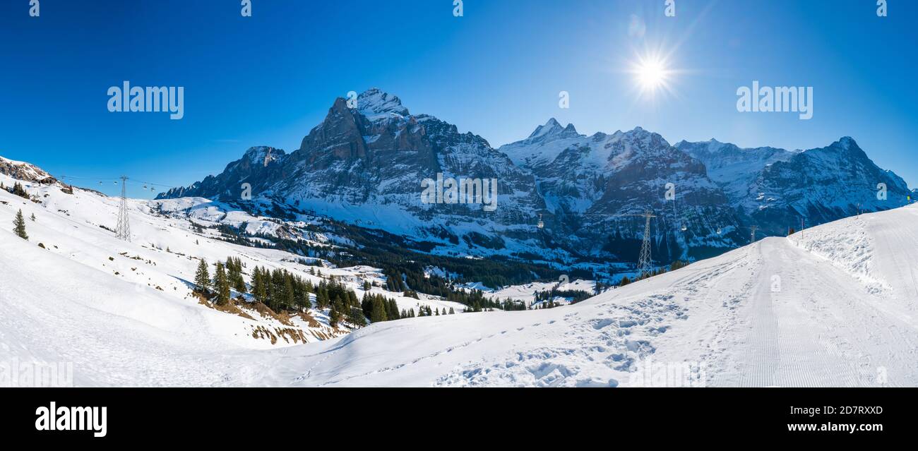 Wide panoramic view of winter landscape with snow covered peaks in ...