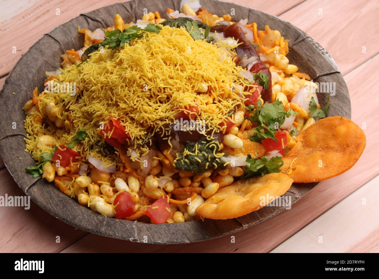 Bhelpuri Chaat/chat is a road side tasty food from India, served in a plate. Stock Photo