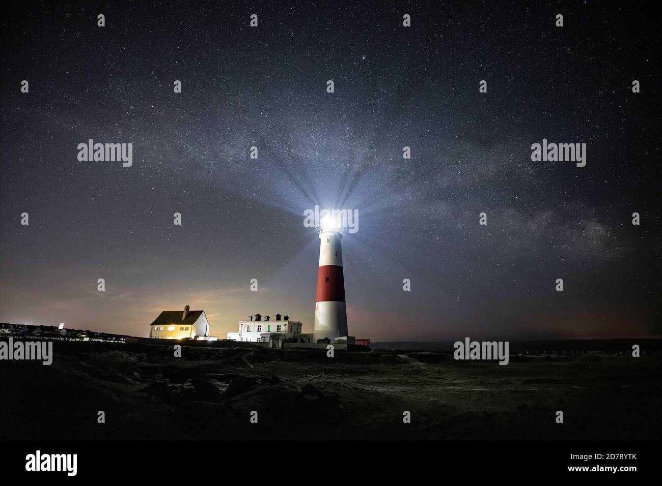 Portland Bill Lighthouse at night with Milky Way, Isle of Portland, Dorset, England, UK Stock Photo