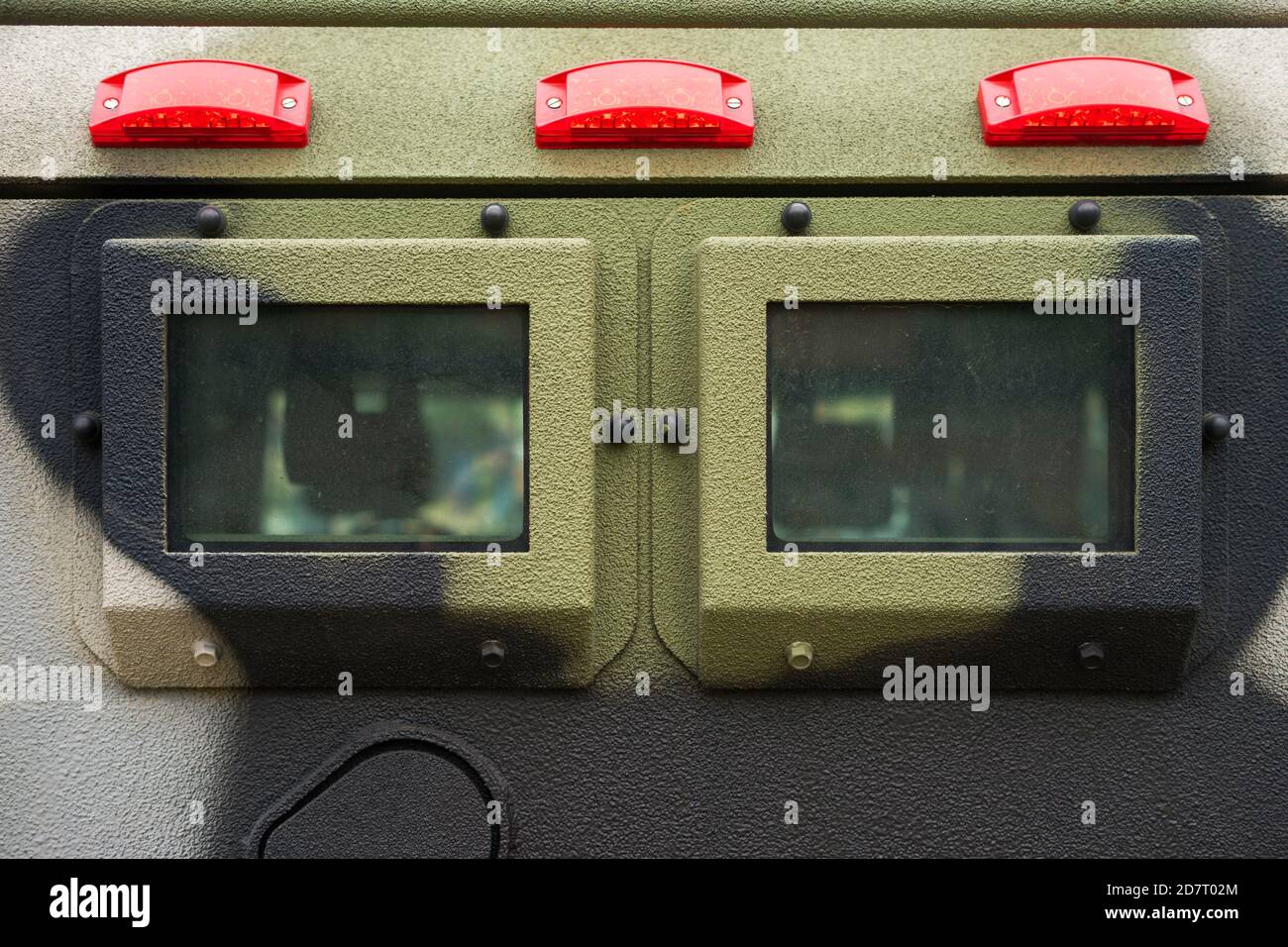 Closeup window and signal lights on military armored vehicle made with solid steel. Stock Photo
