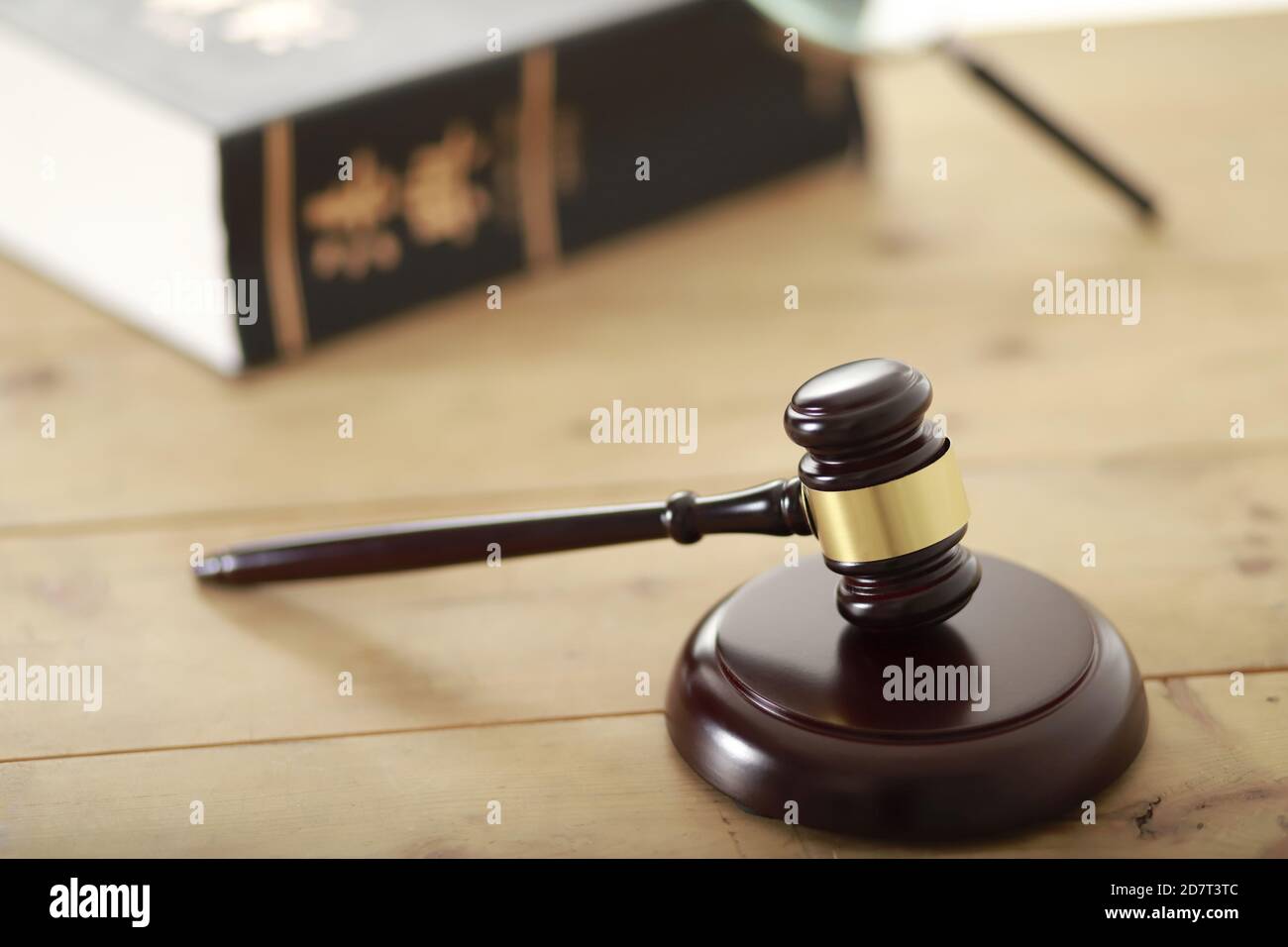 Law concept. Judge's gavel with law book Stock Photo
