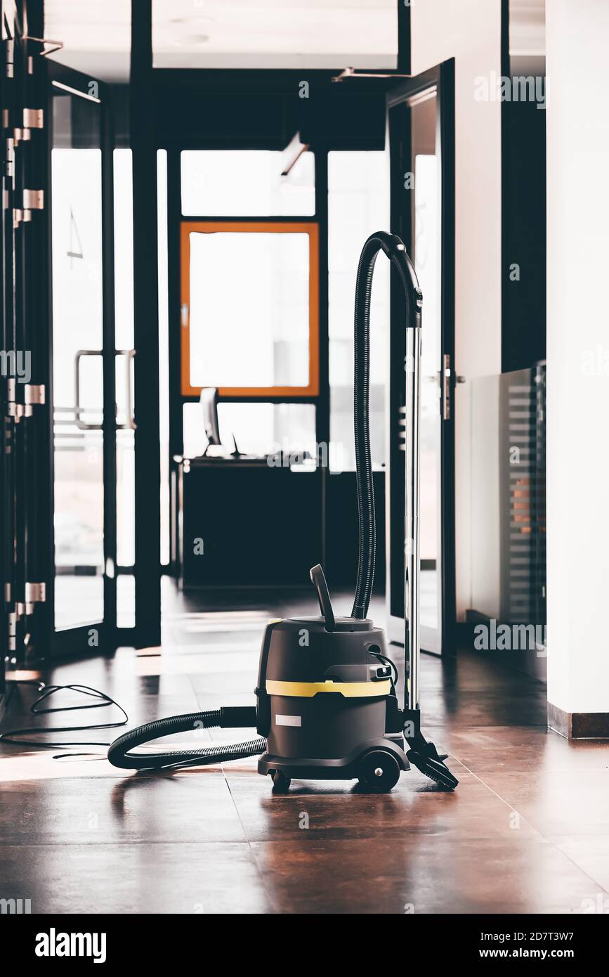 Janitor Cleaning Floor Vacuum Cleaner High Resolution Stock Photography