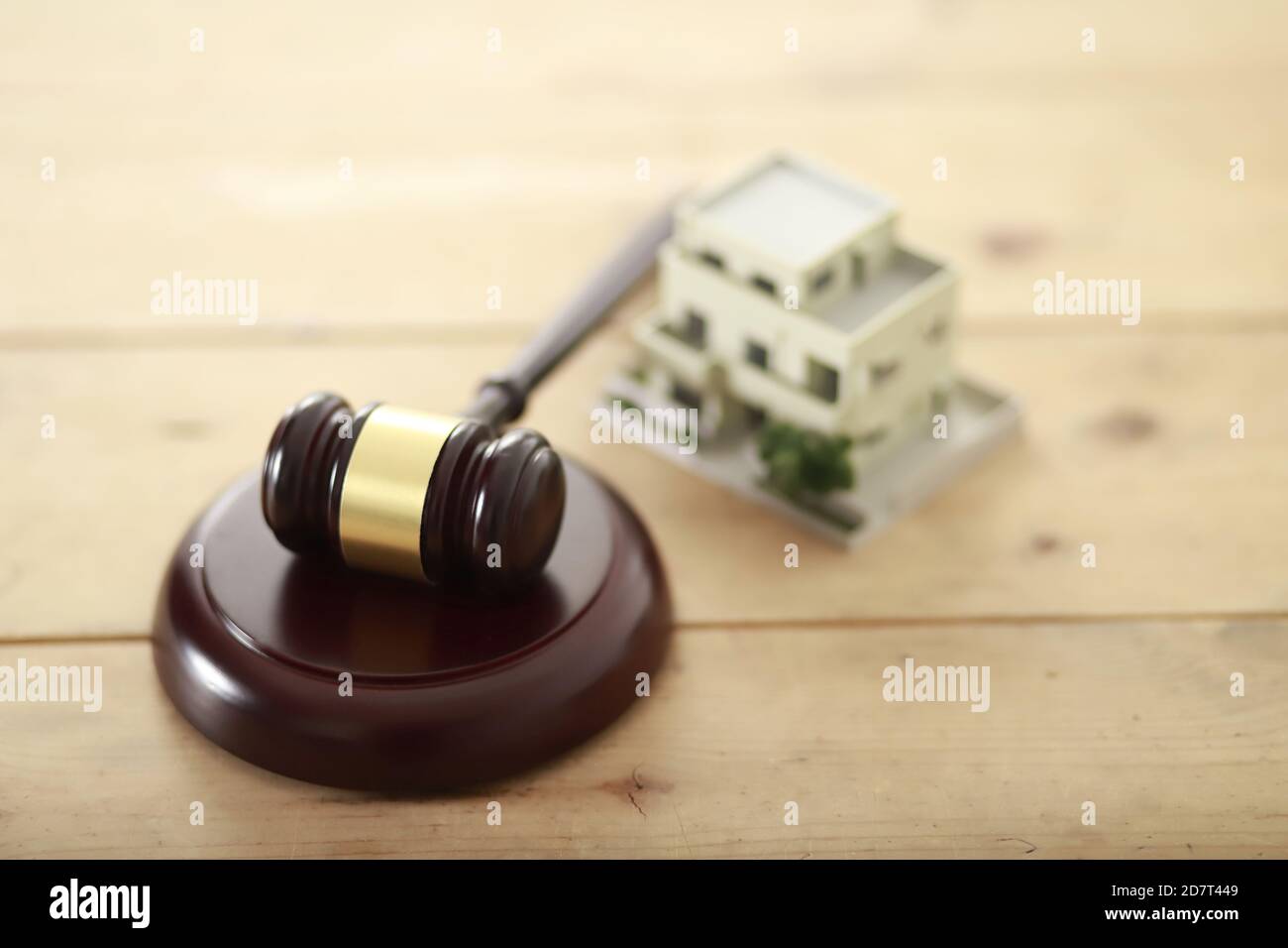 Judge's gavel with model house Stock Photo