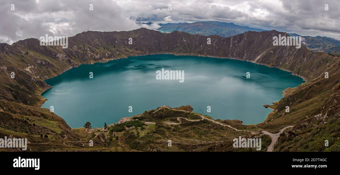 Quilotoa volcanic crater lagoon panorama with moody sky, Quito region ...