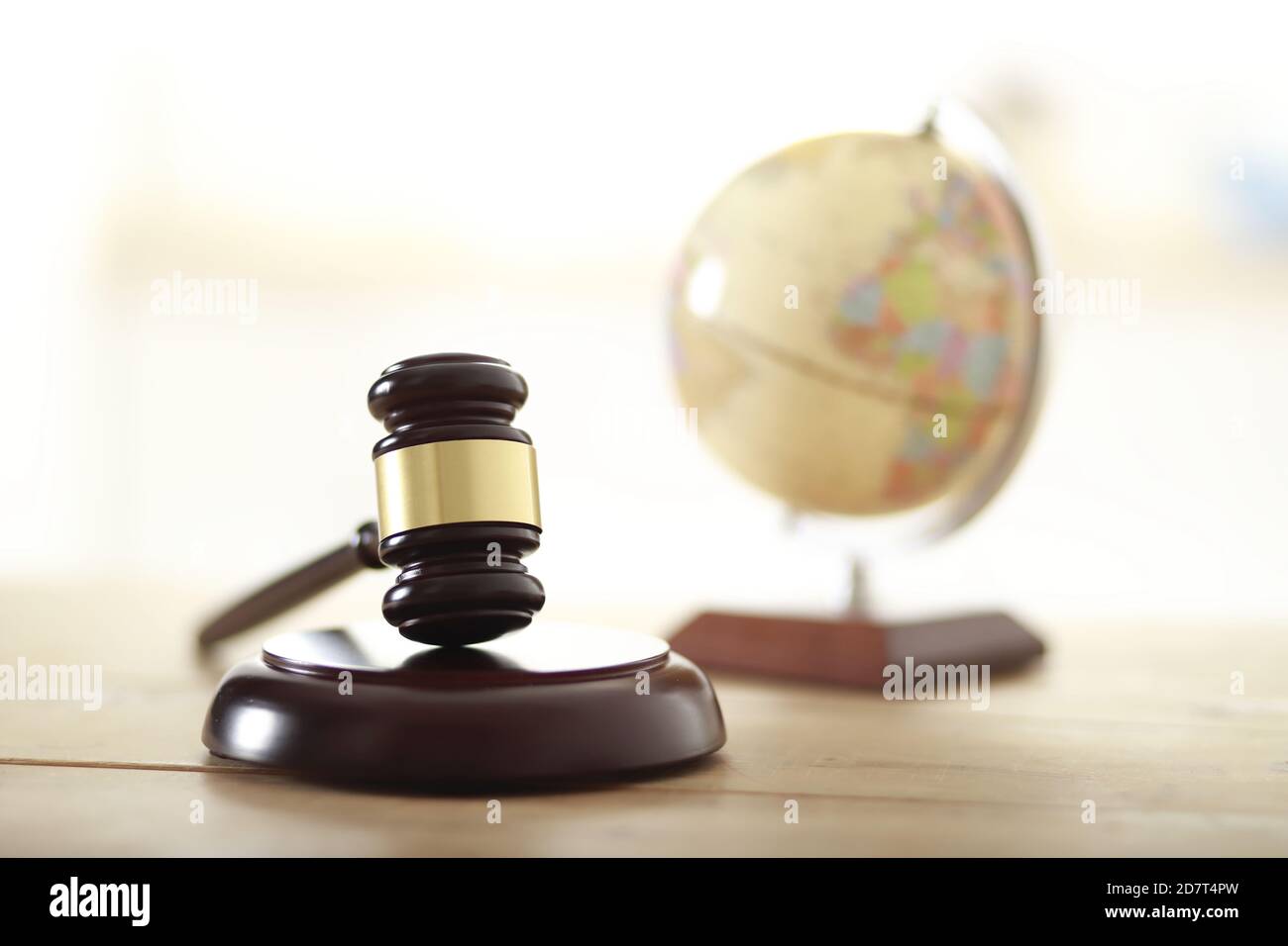 Gavel with globe.Law concept Stock Photo