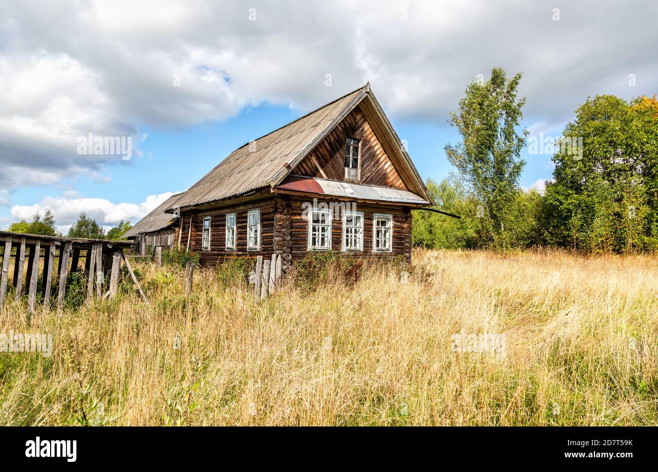 Old rural wooden house in abandoned russian village in summer sunny day ...