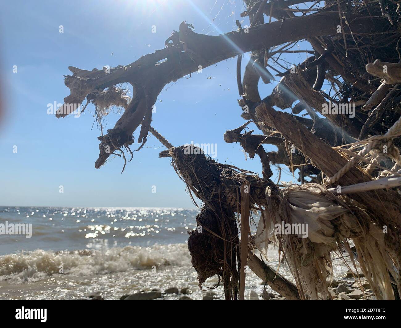 Shipwreck on sea shore. Parts of ship rope Stock Photo - Alamy