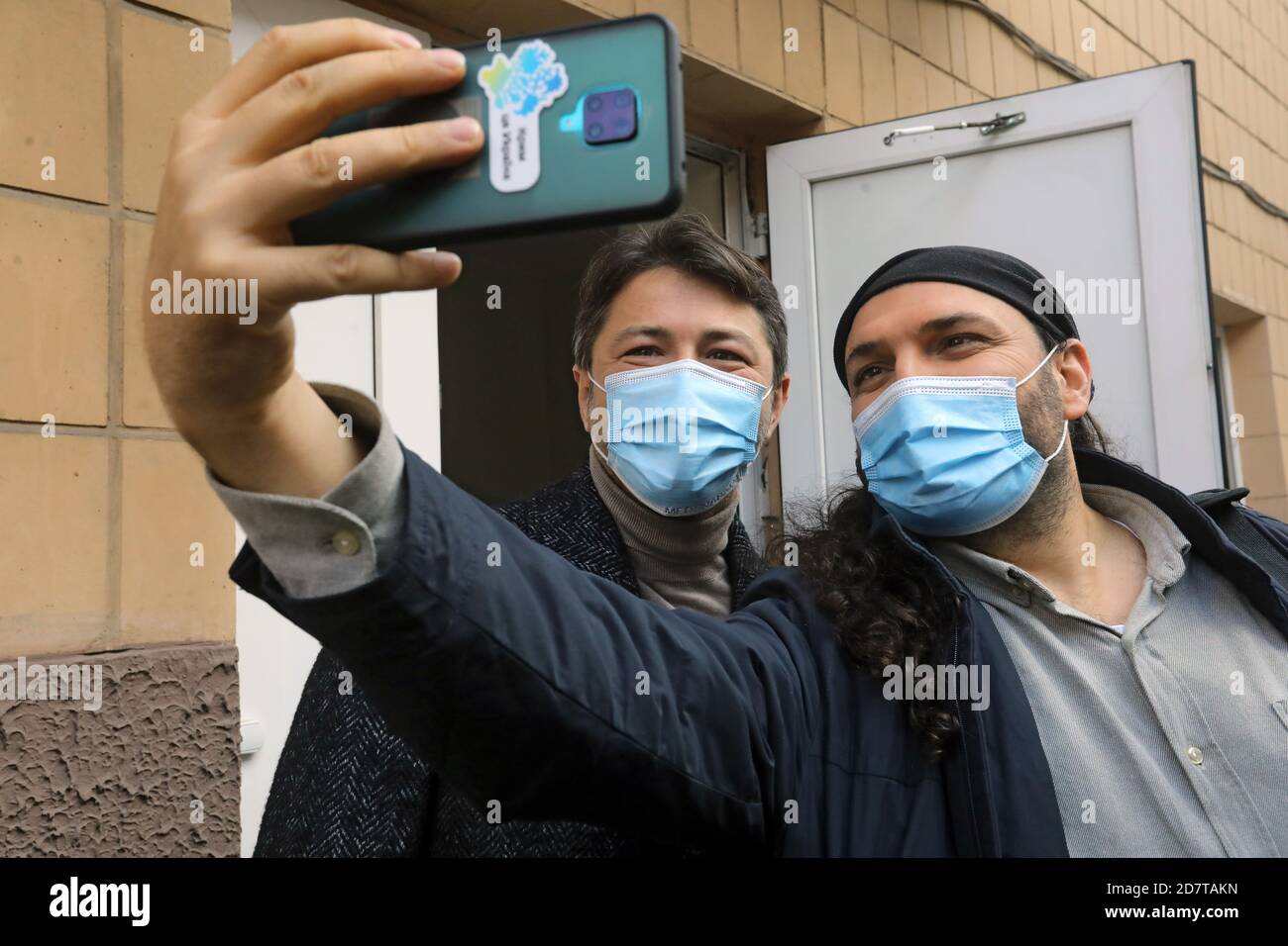 Non Exclusive: KYIV, UKRAINE - OCTOBER 25, 2020 - Kyiv city head hopeful, Ukrainian TV presenter and actor Serhiy Prytula (L) poses for a selfie with Stock Photo