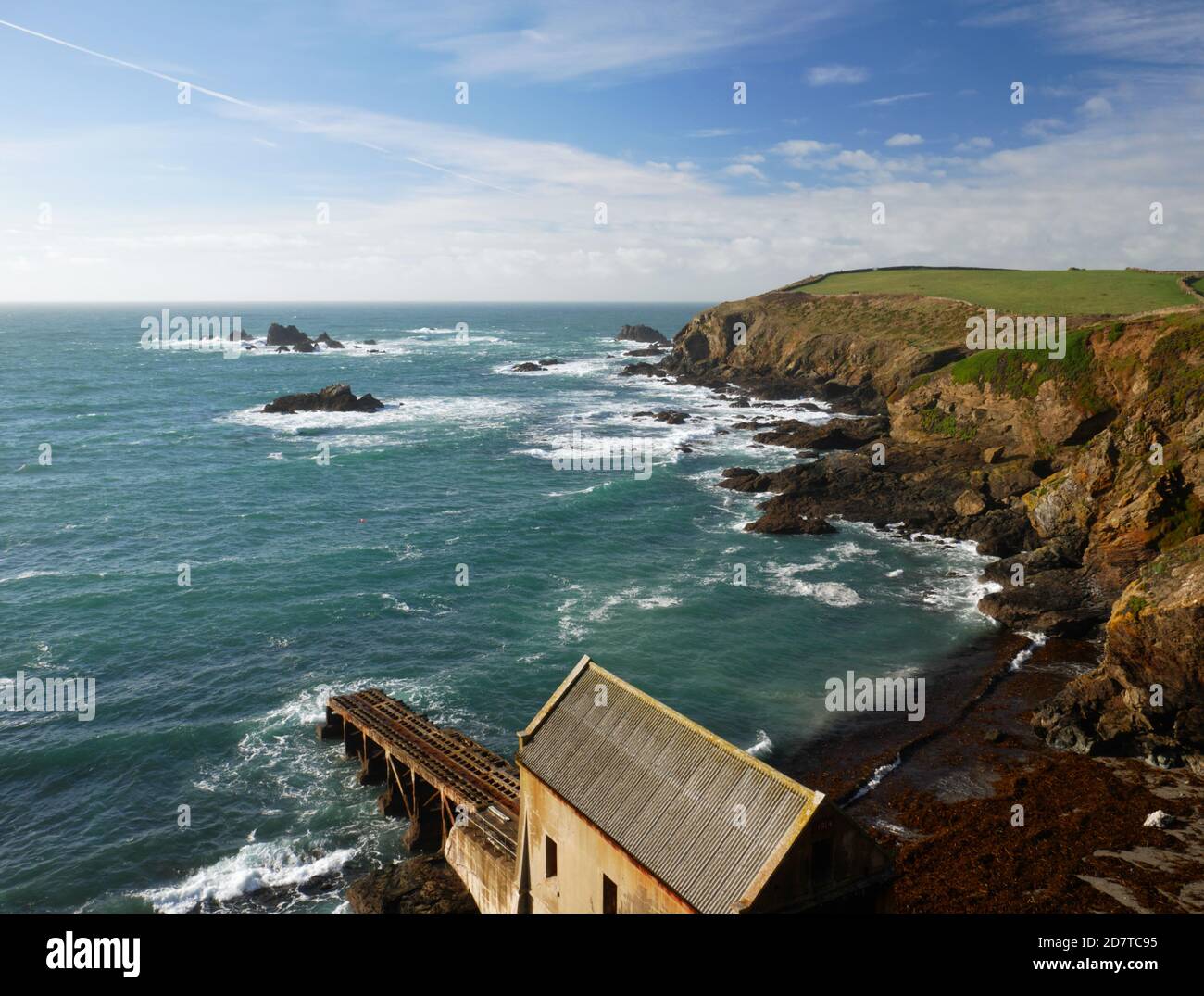 The old lifeboat house at Polpear Cove, The Lizard, on a sunny November day. Stock Photo