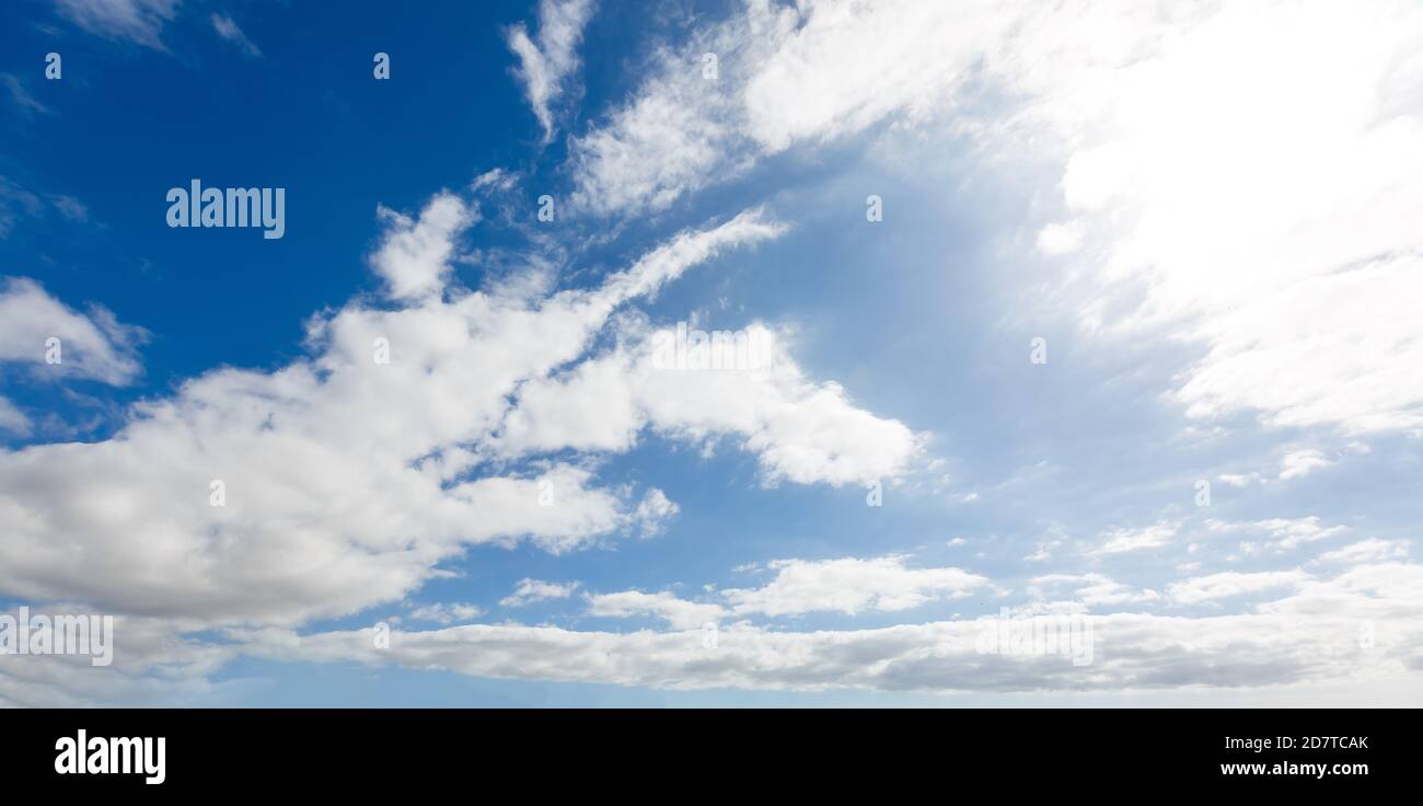 blue sky background with tiny clouds. panorama Stock Photo - Alamy