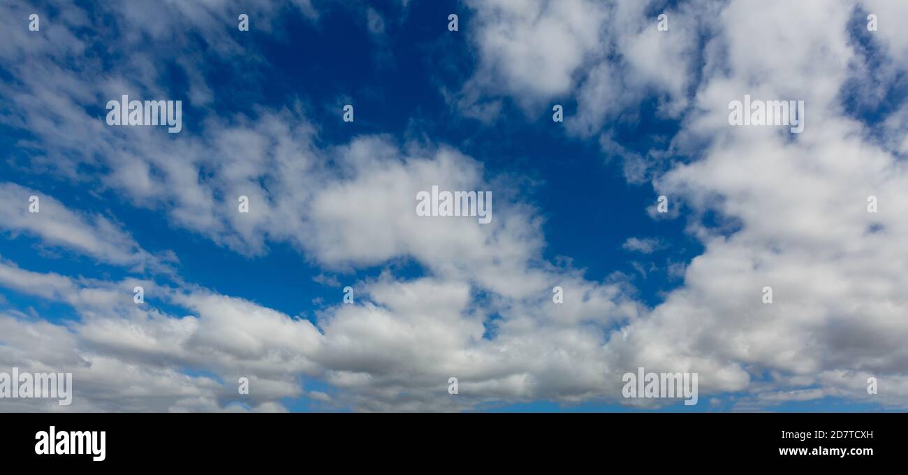 blue sky background with tiny clouds. panorama Stock Photo - Alamy