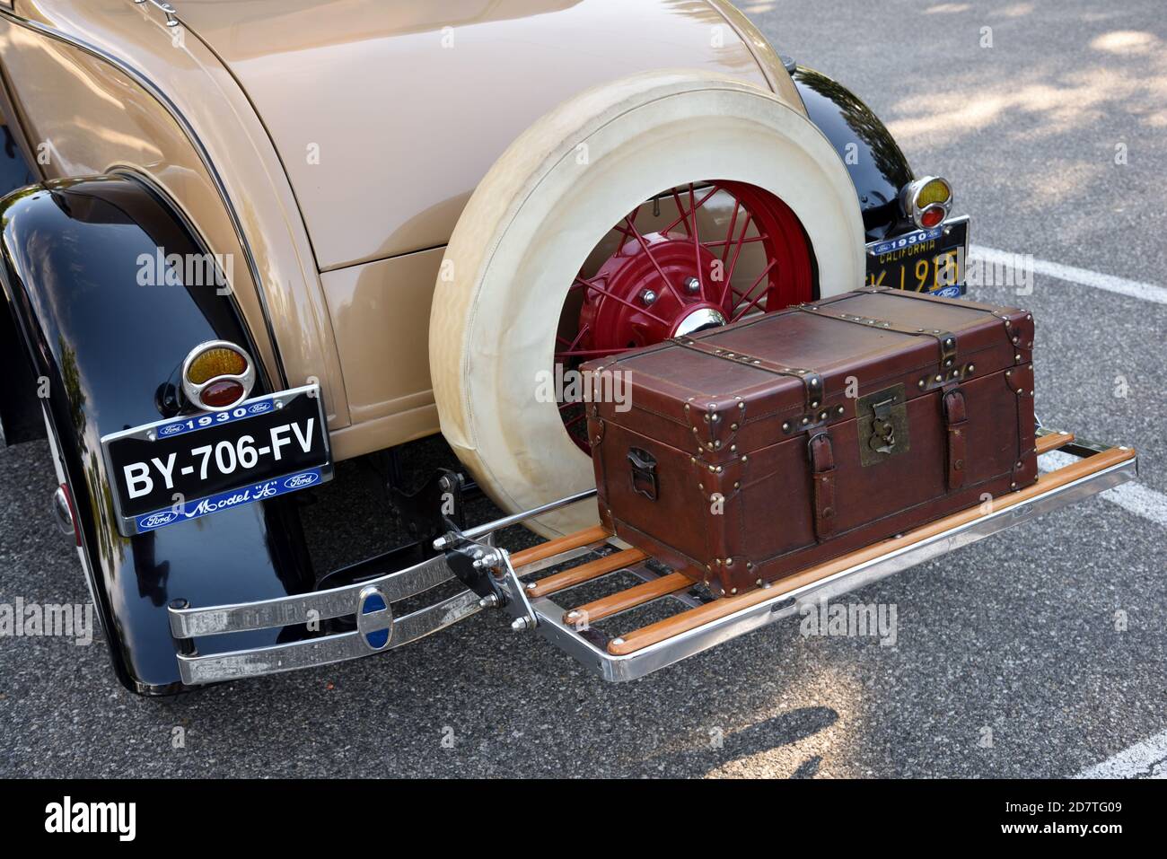 Antique Luggage Rack or Carrier & Vintage Trunk at Rear of Vintage 1930 Ford Model A Car or Automobile Stock Photo