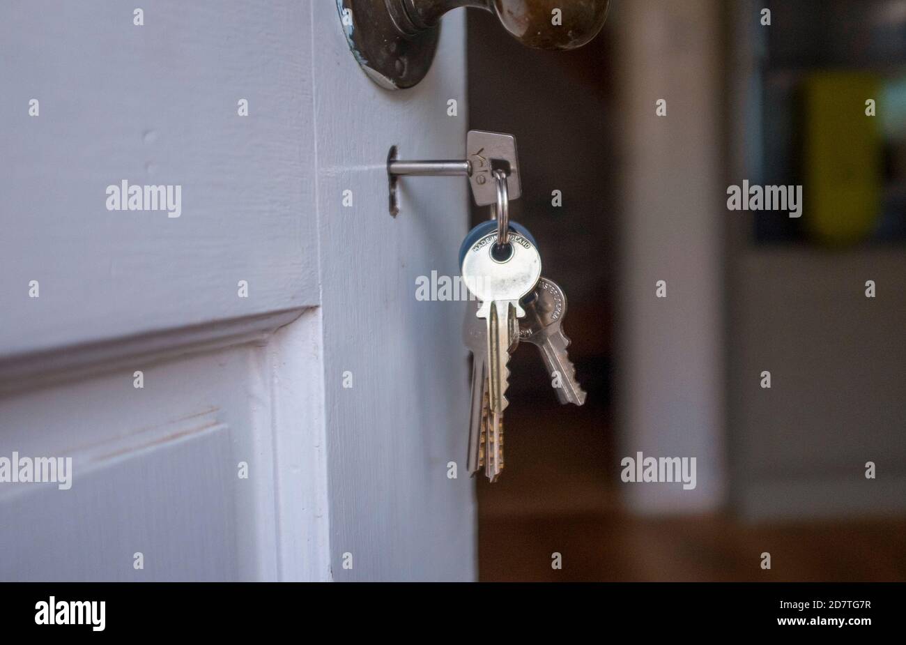 Household keys in a door UK Stock Photo - Alamy