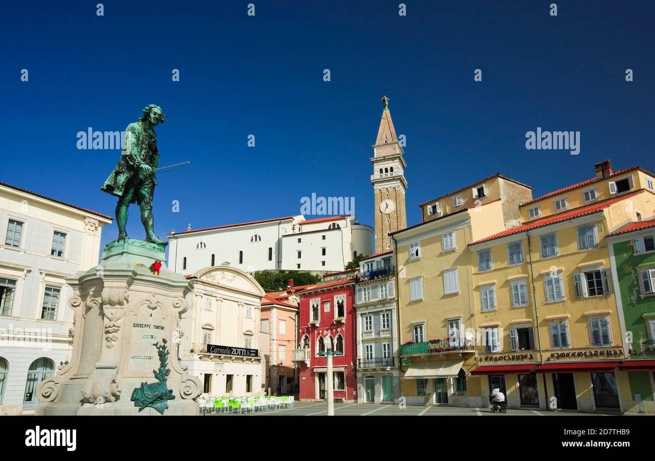 St. George's church with bell tower and statue of Giuseppe Tartini , Tartini Square, Piran, Slovenia Stock Photo