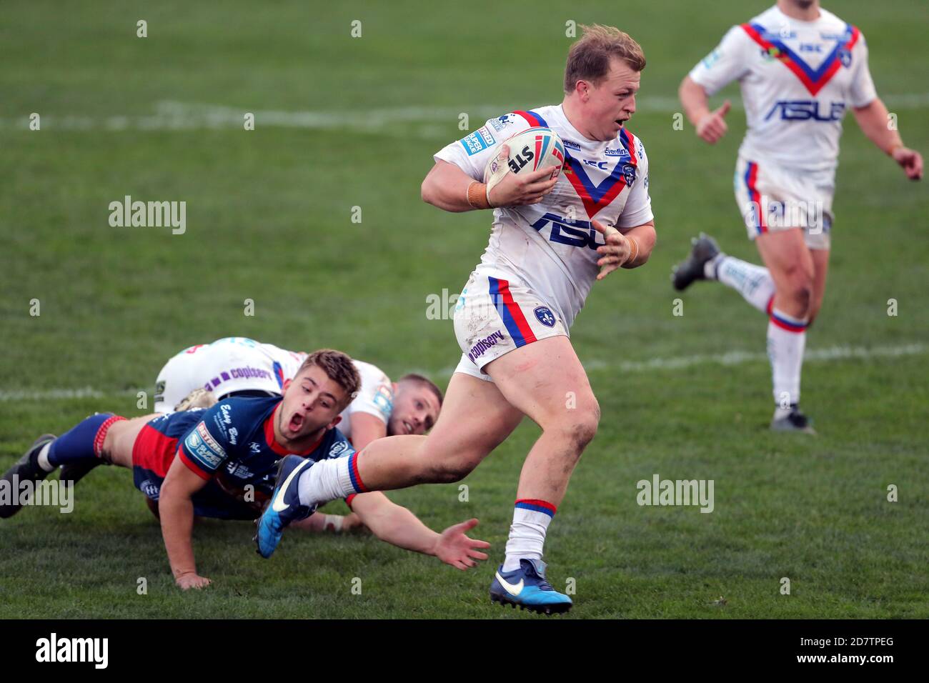 Wakefield Trinity's Eddie Battye breaks clear to score a try during the ...
