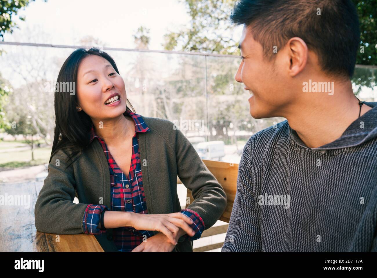 Portrait of young Asian couple enjoying a date and spending good time ...