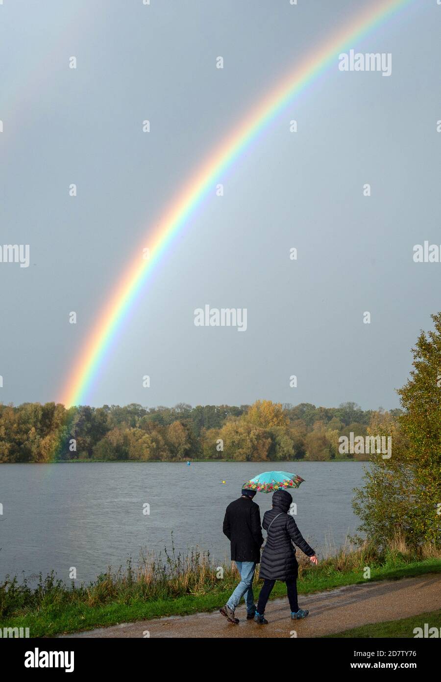 A rainbow appears after a heavy rain shower at Nene Park in