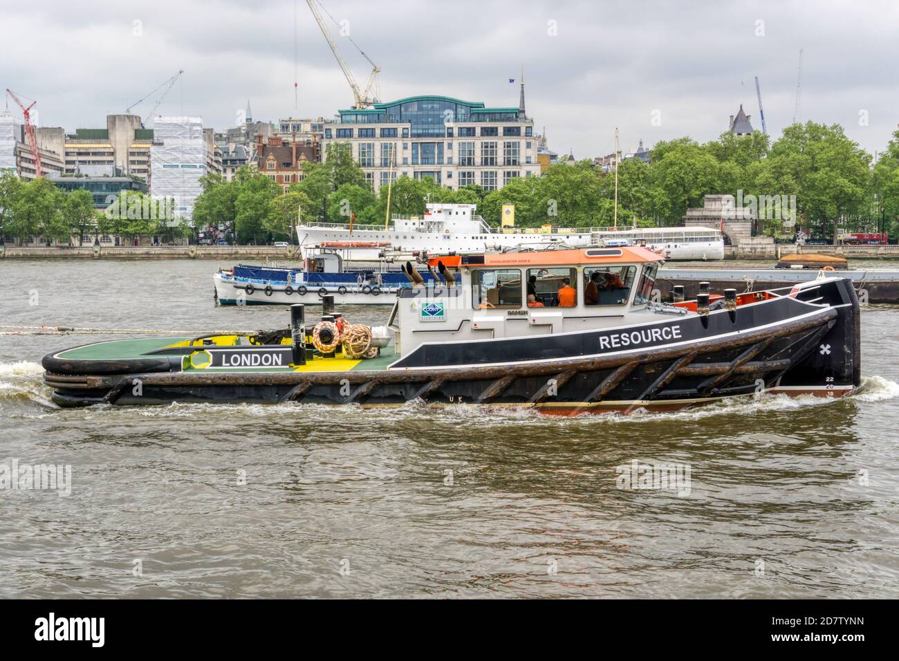 The tug Resource on the River Thames in London. Stock Photo