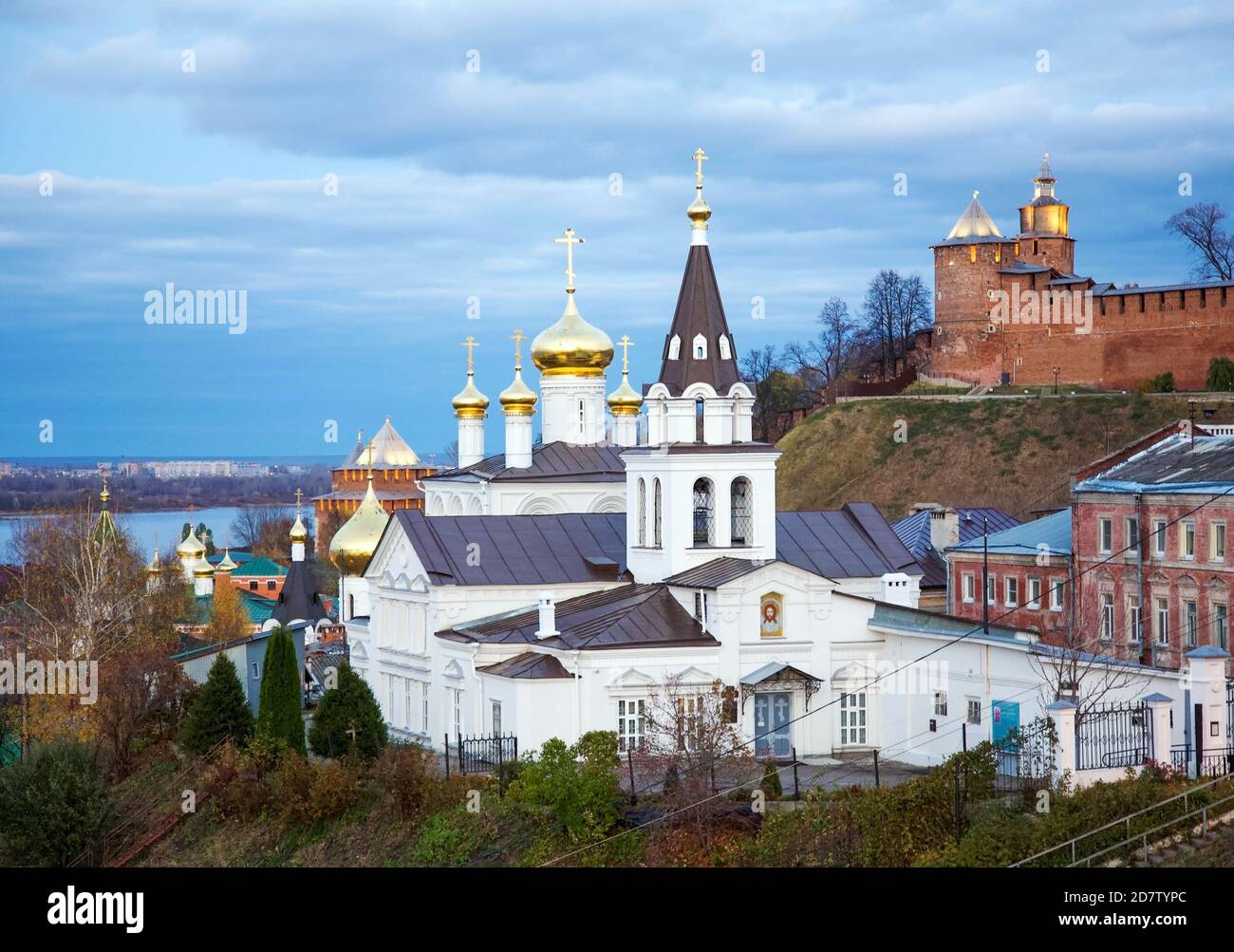 Autumn view of Orthodox Church with domes and spires and the a Kremlin in evening light in the Russian town of Nizhny Novgorod Stock Photo