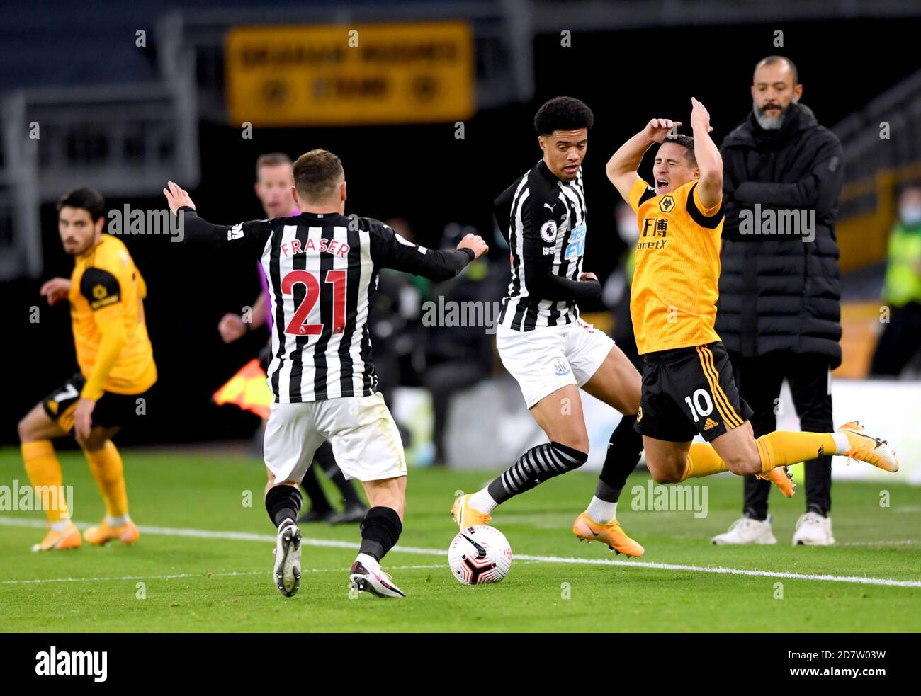 Wolverhampton Wanderers' Daniel Podence (right) battles for the ball with  Newcastle United's Ryan Fraser (left) and Jamal Lewis during the Premier  League match at Molineux, Wolverhampton Stock Photo - Alamy
