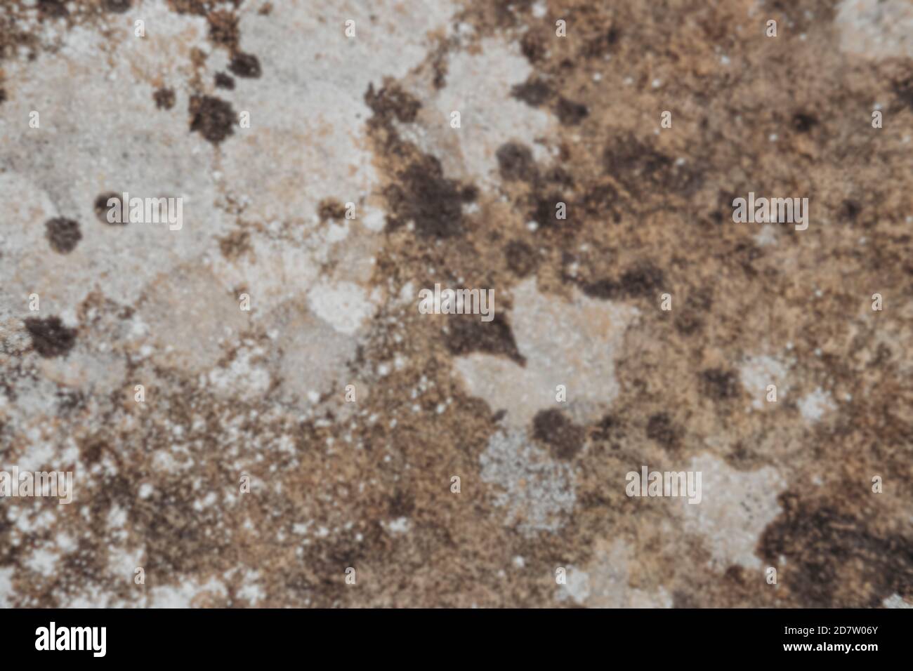 blurred defocused stone texture for background design, spotted wall ...